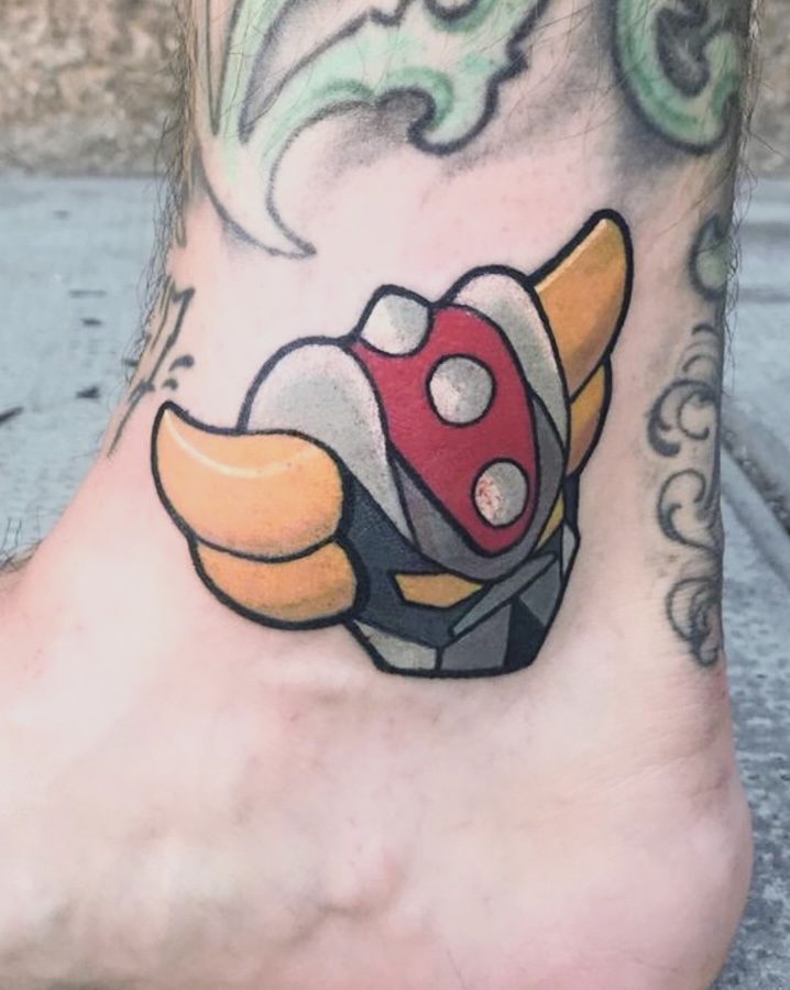 Tatouage de Goldorak en style cartoon par Coyote