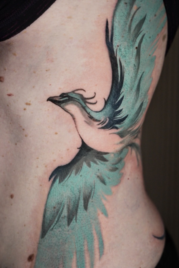 Tatouage néoréaliste de Phoenix en couleur par Bryan Ly
